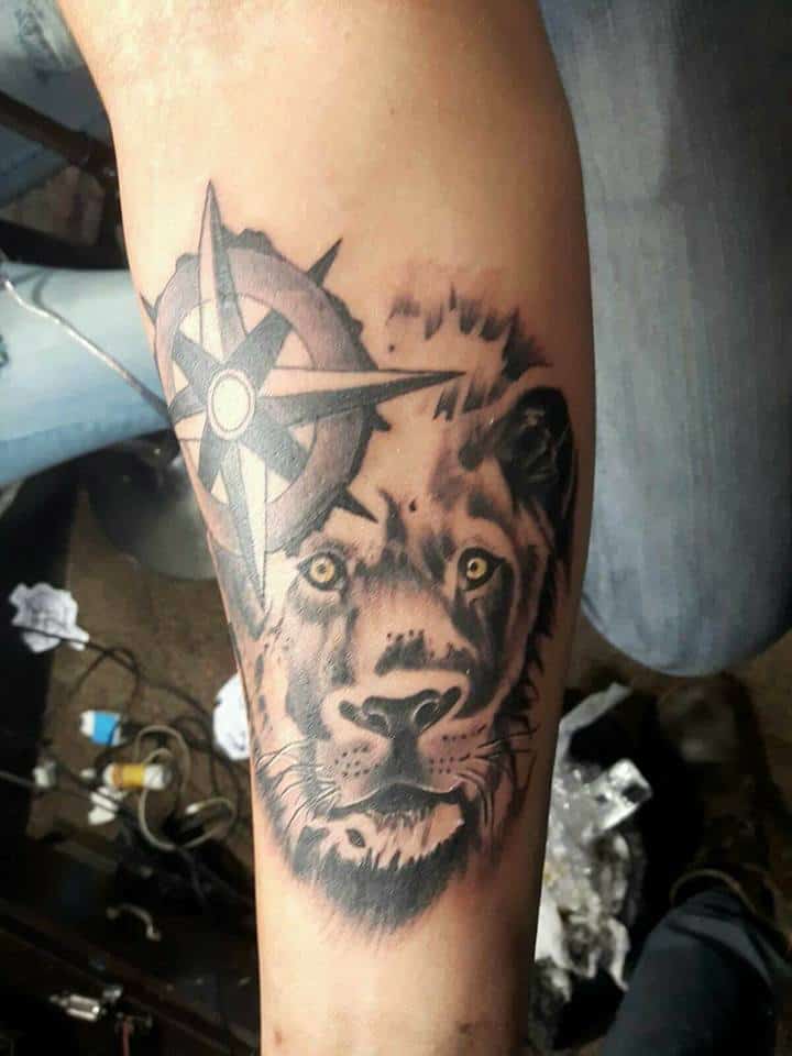 lion face tattoo - gargoyle tattoo studio