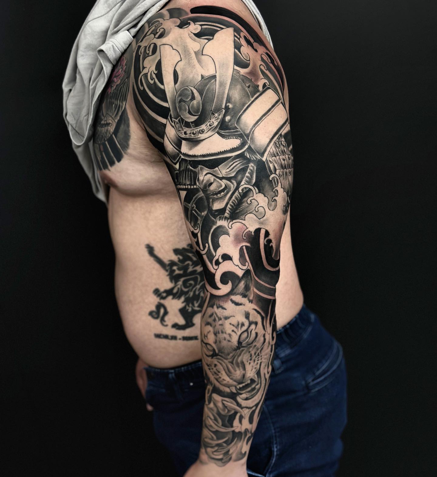 full sleeve realistic tattoo by gargoyle tattoo studio